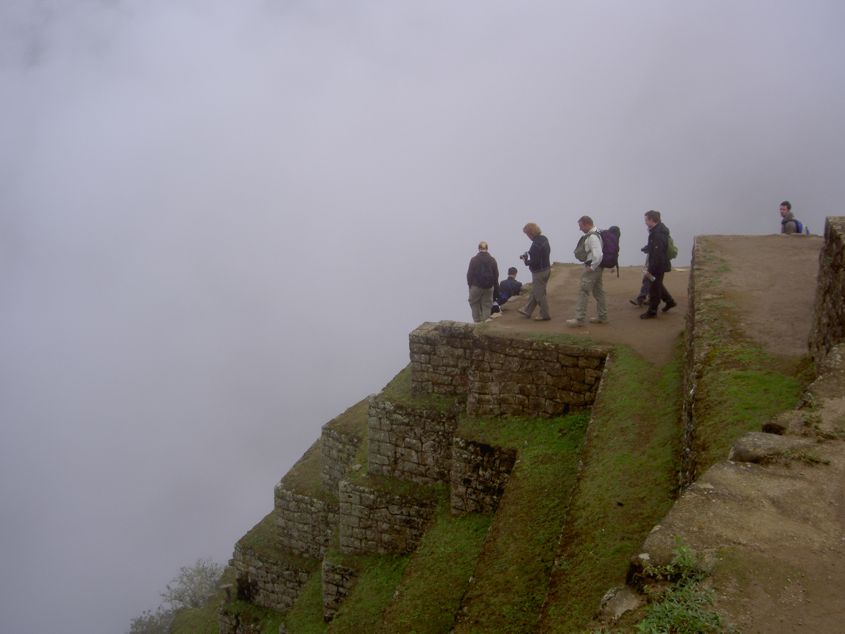 People, Machu Picchu and clouds
